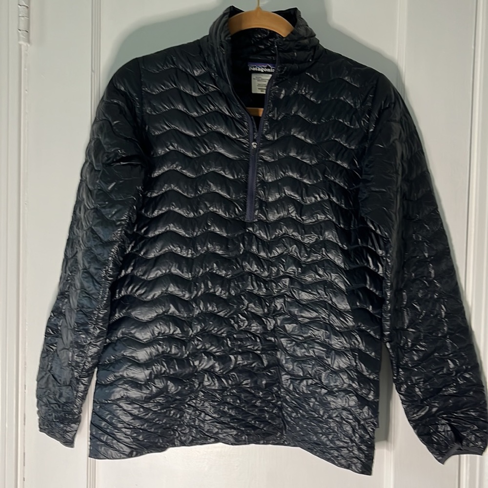 Patagonia down sweater.  3/4 zip.  Packable with bag.